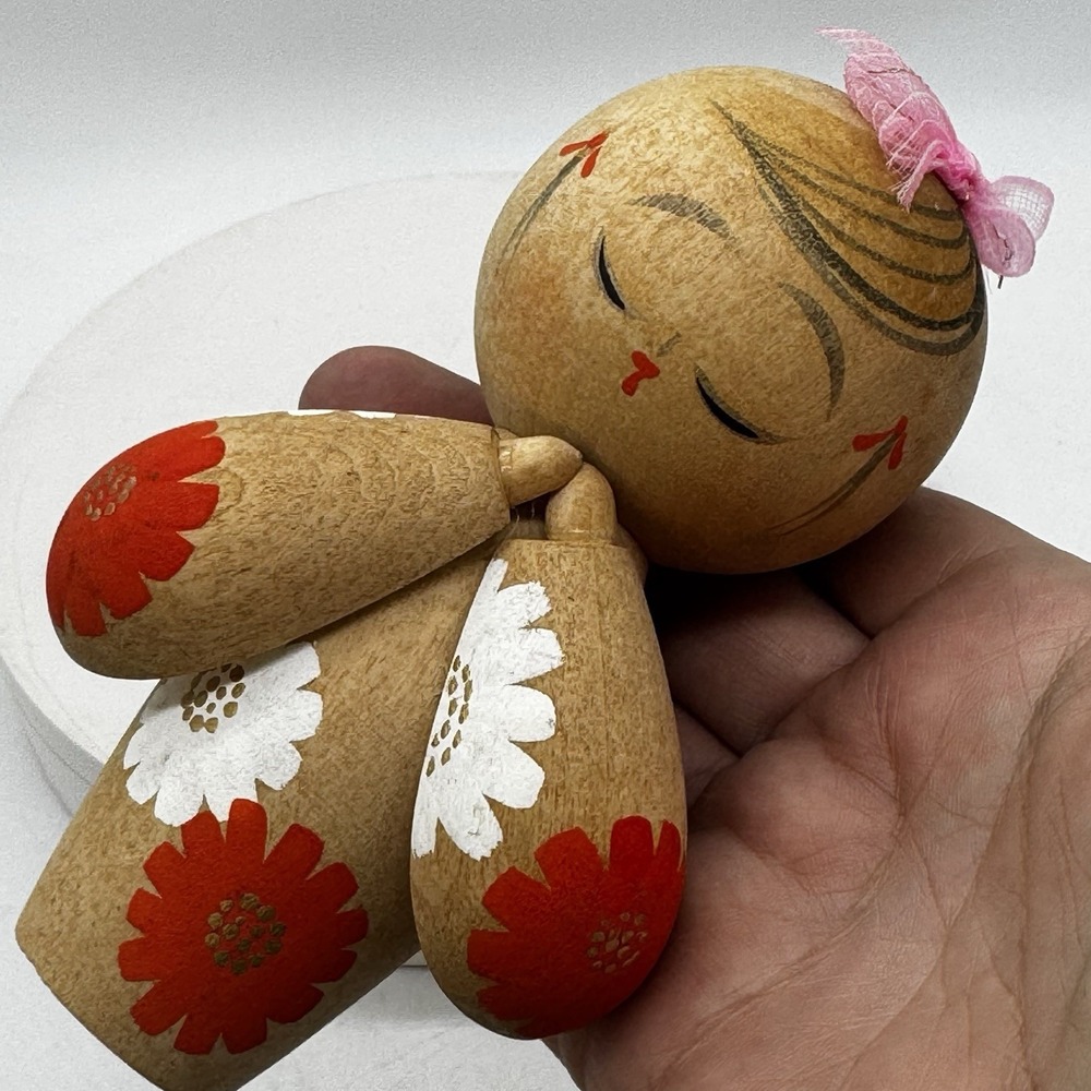 Japanese Wooden Kokeshi Doll Signed Floral Girl Bow Folded Hands 5.5" Orange Vtg